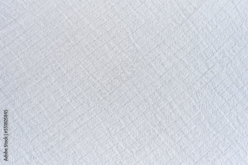 The texture of the wrinkled white fabric