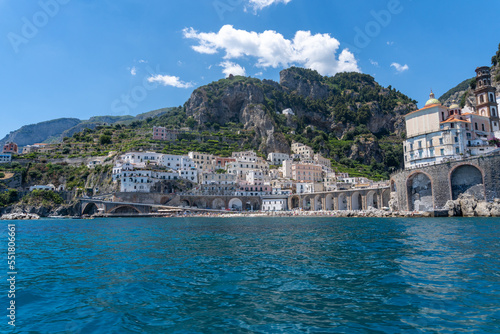 Fototapeta Naklejka Na Ścianę i Meble -  View of the Amalfi coast, captured from a boat on a sunny day.