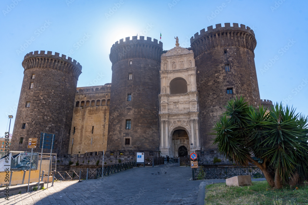 Nuovo Castle in Naples, with a piece of the subway works, on a sunny day.