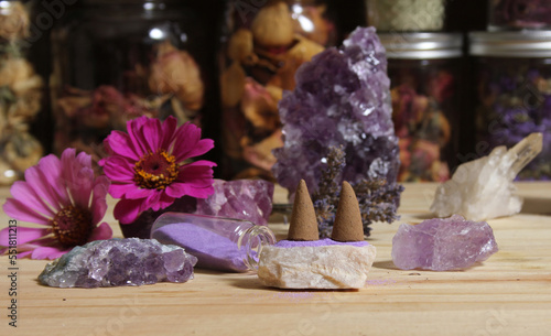 Amethyst Crystals With Flowers and Incense Cones on Meditation Table