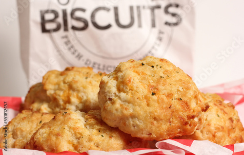 Fresh Garlic Cheese Biscuits With Biscuit Sign in Background Shallow DOF