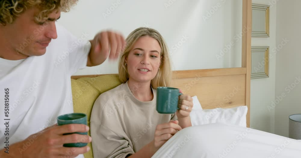 Love, couple in bed and coffee in morning, relax and happy on weekend, bonding and romantic. Romance, man and woman with tea, in bedroom and enjoy vacation for wellness, loving and happiness on break Love, couple in bed and coffee in morning, relax and happy on weekend, bonding and romantic. Romance, man and woman with tea, in bedroom and enjoy vacation for wellness, loving and happiness on break