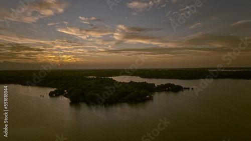  HQ Aerial Timelapse - Drone moving aside at the sunset boats in the way