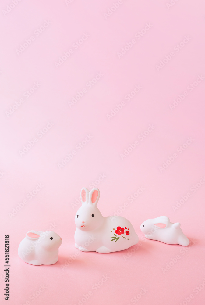 Japanese New Year's card material. zodiac rabbit. Rabbit on pink background. 日本の正月素材。干支のウサギ。ピンク背景上のウサギ。 Japanese New Year's card material. zodiac rabbit. Rabbit on pink background. 日本の正月素材。干支のウサギ。ピンク背景上のウサギ。