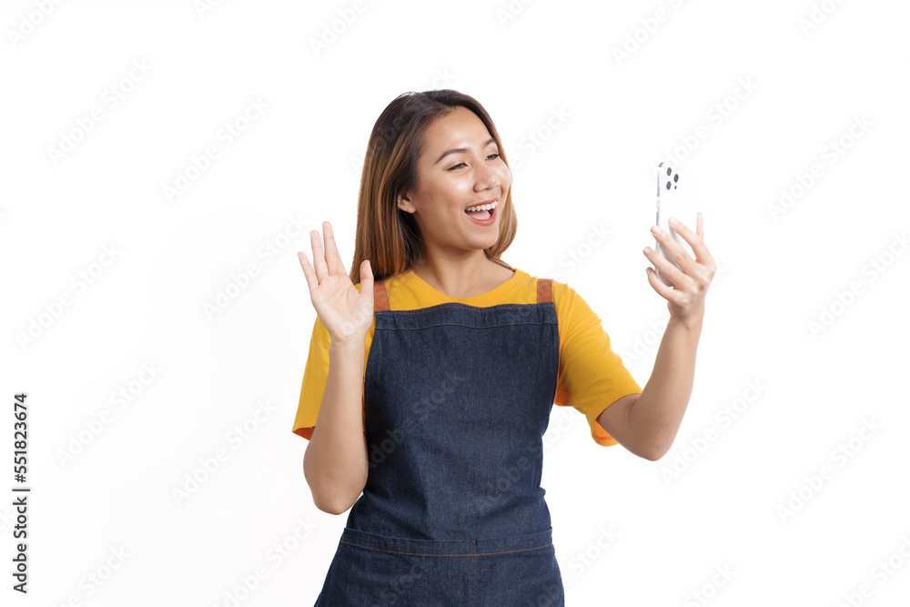 Smiling female asian people wearing apron working in a bakery coffee shop owner isolated on white background. Smiling female asian people wearing apron working in a bakery coffee shop owner isolated on white background.