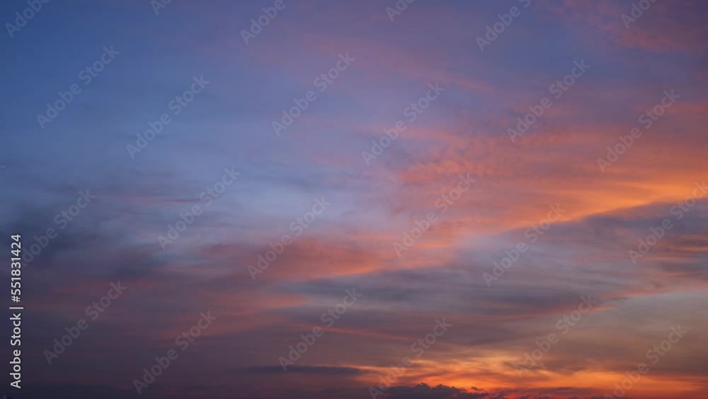 4K : Fast timelapse motion video of beautiful colorful clouds, Majestic sunset sky landscape. cloudscape time-lapse. loop of sky. nature background. weather and the movement of nature concept.
