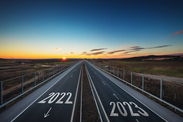 Driving on open highway road at beautiful sunny day to new year 2023, aerial view, transportation, logistic, travel and lifestyle concept