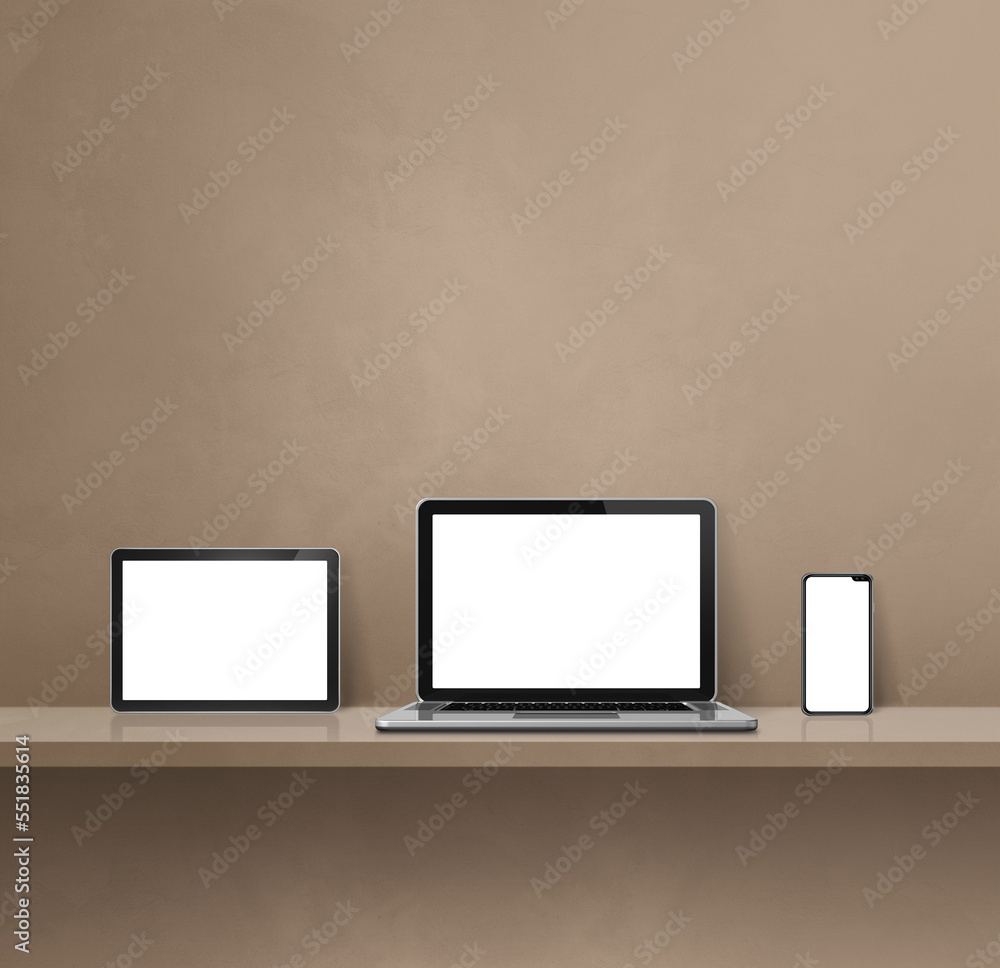 Laptop, mobile phone and digital tablet pc on brown wall shelf. Square background Laptop, mobile phone and digital tablet pc on brown wall shelf. Square background
