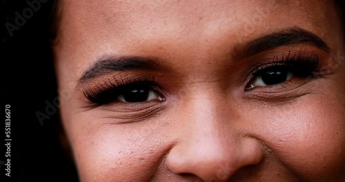 African mixed race young woman macro close-up face smiling