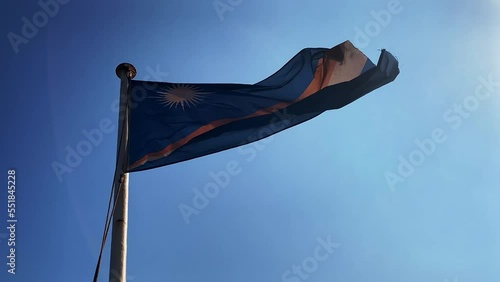 MARSHALL ISLAND FLAG WAVING AT THE HIGH SEAS photo