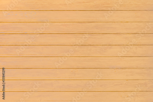 Light yellow coating imitating the wooden fence wall texture plank background