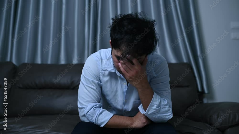 Asian handsome man stress from work overload,Tired male come back home after a lot of work from company,risk of depression Asian handsome man stress from work overload,Tired male come back home after a lot of work from company,risk of depression
