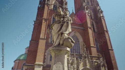 View of the Cathedral of St. John the Baptist in Wroclaw on Ostrow Tumski. Old town, Poland, church, architecture, Roman Catholic, gothic, neo-gothic, gimbal. 4K Video Footage.