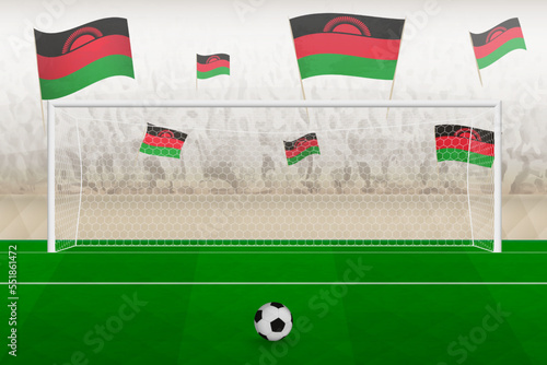 Malawi football team fans with flags of Malawi cheering on stadium, penalty kick concept in a soccer match.