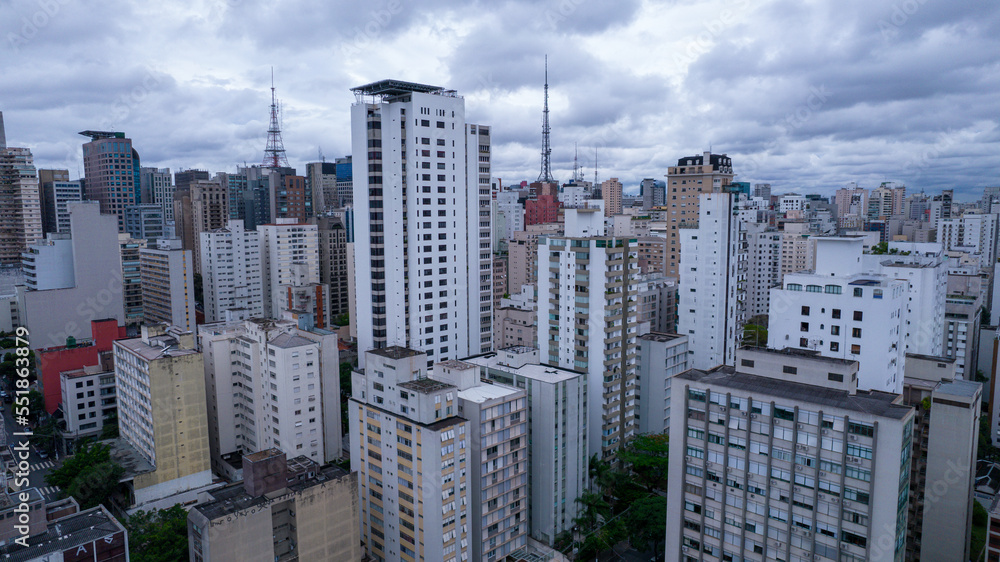 Naklejka premium Aerial view of Av. Paulista in São Paulo, SP. Main avenue of the capital. Sunday day, without cars, with people walking on the street.