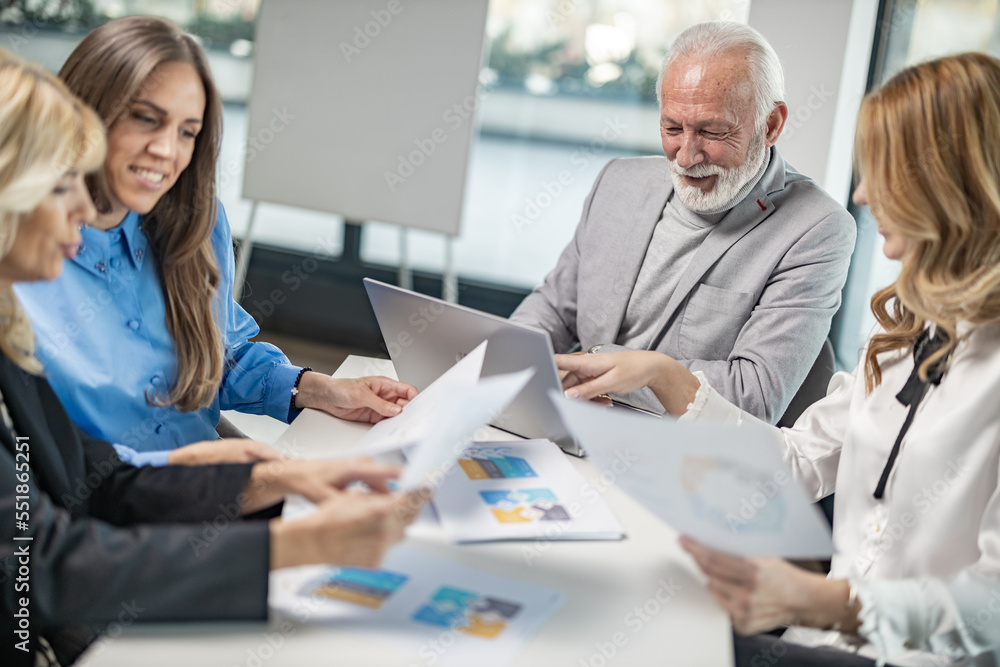 Business people on the meeting, four people excanging their expiriences
Blonde woman model