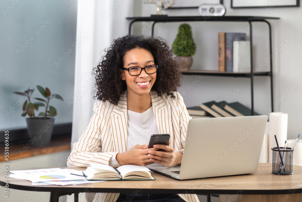 Portrait of a young successful African American businesswoman or an ...
