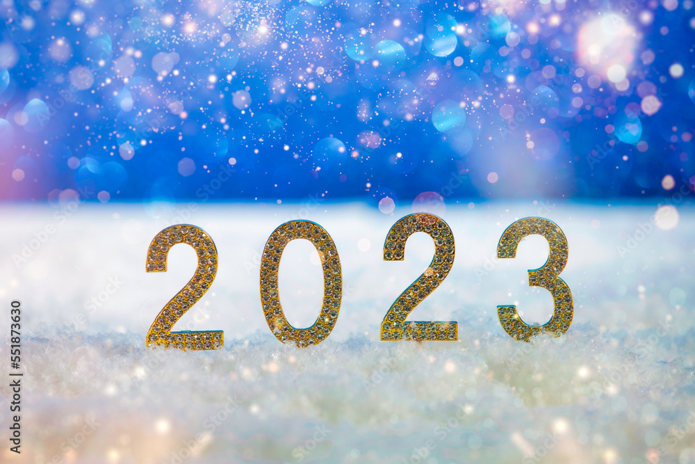 Happy New Year 2023. Beautiful snowy Christmas background with golden numbers 2023. Banner, postcard 2023. Happy New Year 2023. Beautiful snowy Christmas background with golden numbers 2023. Banner, postcard 2023.