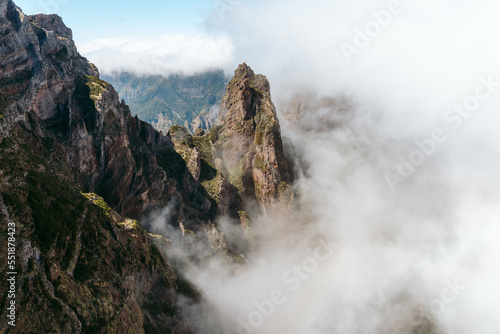 mountain landscape with clouds and peaks