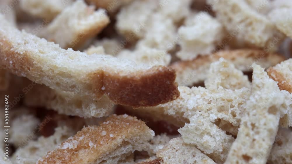 White Bread Crackers Rotating. Bread Crispy Crackers From White Bread Rotated. Breadcrumbs. Close Up. Top View. 4k, ProRes White Bread Crackers Rotating. Bread Crispy Crackers From White Bread Rotated. Breadcrumbs. Close Up. Top View. 4k, ProRes