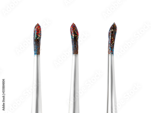 Set of three wet brushes with colored glitters. Png isolated with transparency photo