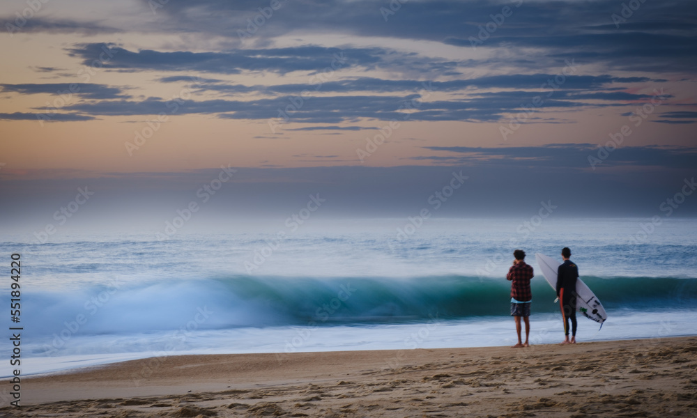 Surfers at sunset waves, Hossegor