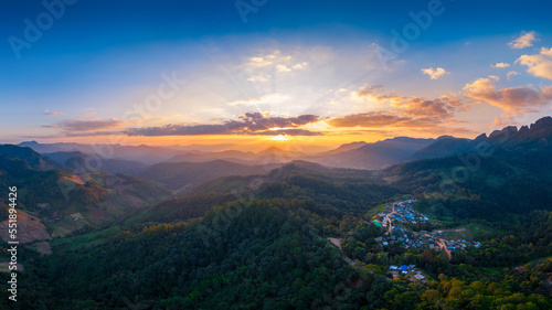 Aerial view of sunset on mountains.