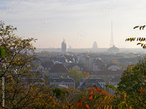 Nebliger Blick vom Fockeberg über die Dächer der Stadt. Leipzig, Sachsen, Deutschland
 photo