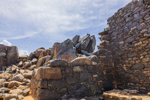 Close up view of ruins of Bushiribana gold smelter in national park on island of Aruba. photo