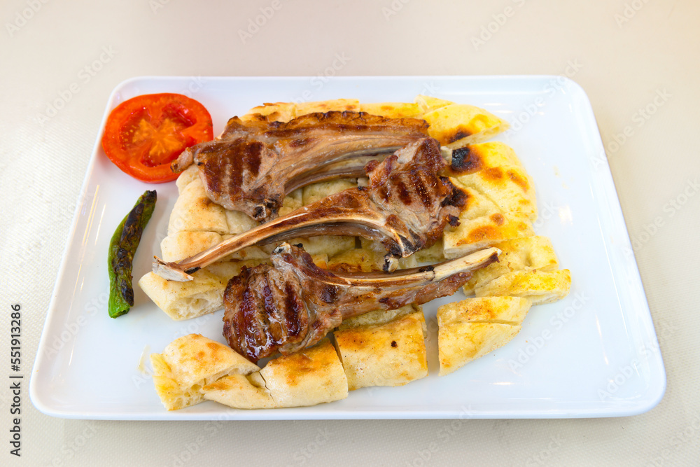 Beef steak grill with rice pilaf, fried potatoes, grilled pepper and tomatoes.Mix Platter with Beef rips, Cutlets, Potatoes and Sauces. Beef steak grill with rice pilaf, fried potatoes, grilled pepper and tomatoes.Mix Platter with Beef rips, Cutlets, Potatoes and Sauces.