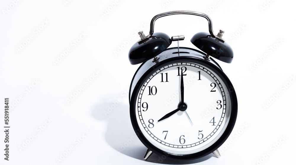 Old style alarm clock isolated on white Old style alarm clock isolated on white