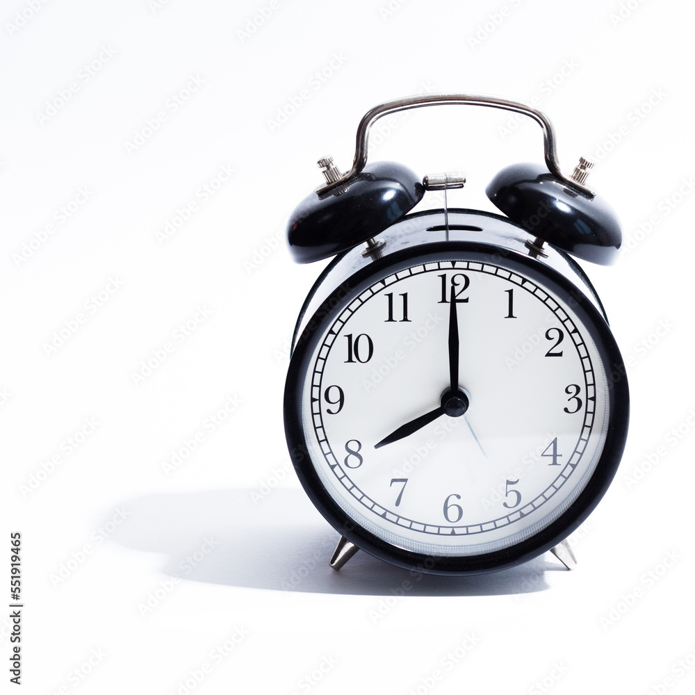 Old style alarm clock isolated on white Old style alarm clock isolated on white