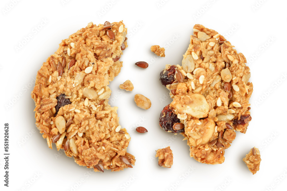Granola cookie isolated on white background with full depth of field. Top view. Flat lay. Granola cookie isolated on white background with full depth of field. Top view. Flat lay.