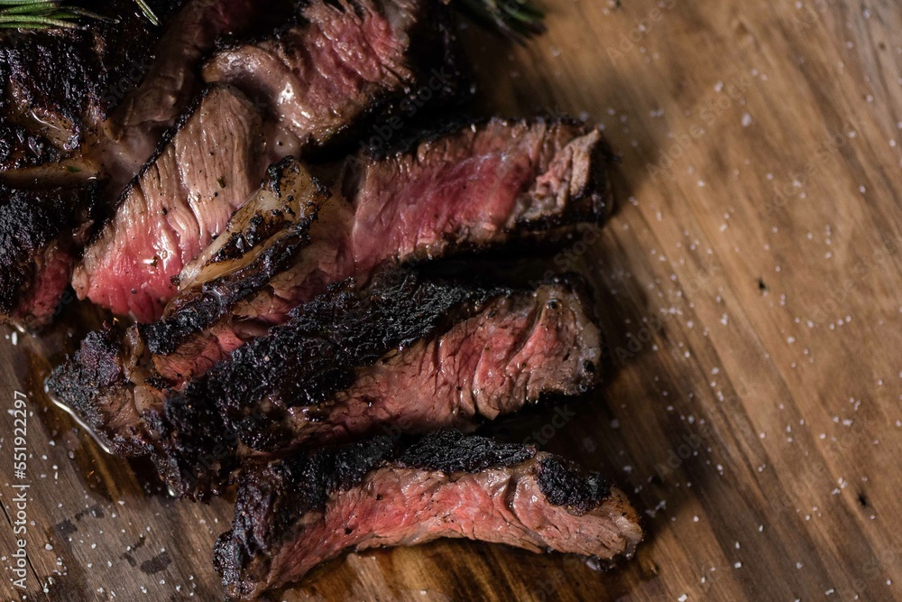 Sliced steak at on board Sliced steak at on board