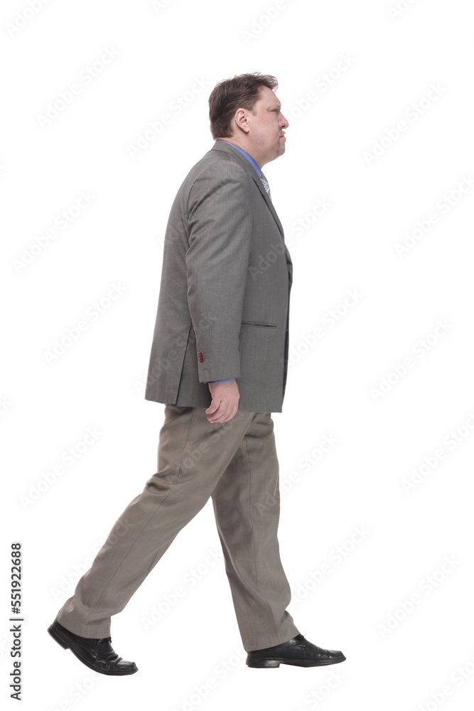 full-length. casual man in a grey jacket striding forward. full-length. casual man in a grey jacket striding forward.