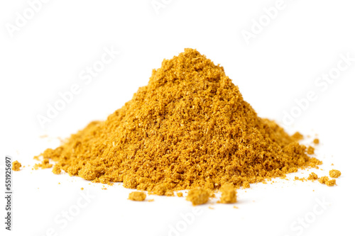 Pile of curry powder isolated on white