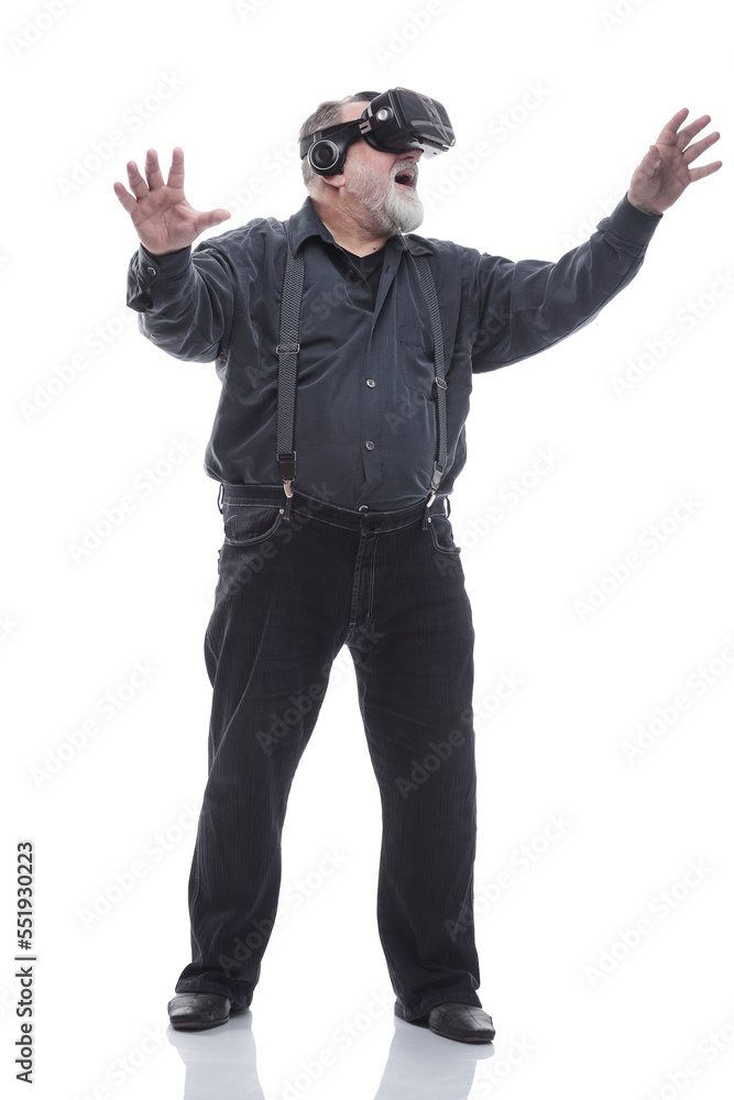 modern adult male in a virtual reality helmet. isolated on a white modern adult male in a virtual reality helmet. isolated on a white
