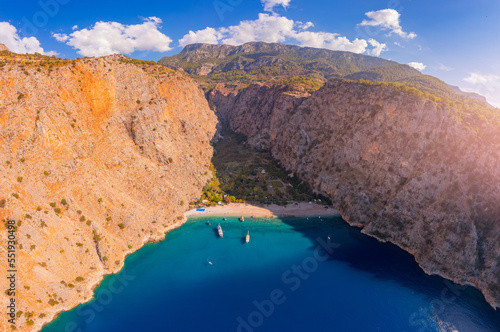Fototapeta Naklejka Na Ścianę i Meble -  Amazing beach Butterfly Valley in Oludeniz Fethiye Turkey, aerial top view