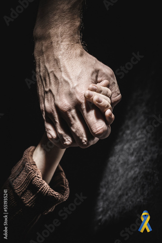 male hand hold children hand