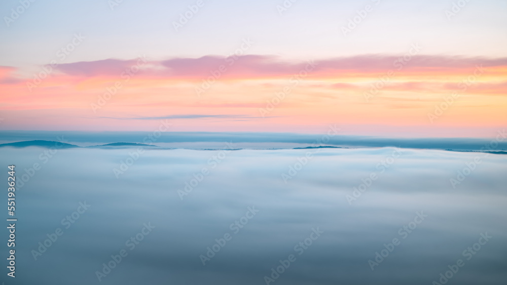 sunrise over the fog