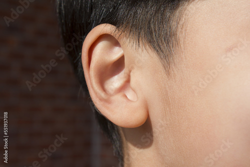 Ear of child or ear of boy. photo