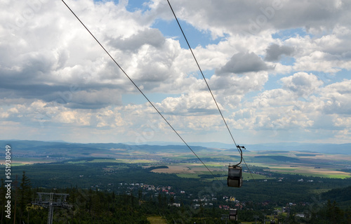 Gondola gliding through the air in the awe-inspiring natural beauty of the High Tatras transports visitors from the Tatranska Lomnica to Skalnate Pleso