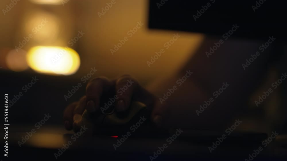 woman working online at home on the computer, freelancing, female hand working on a mouse and answer the phone close up woman working online at home on the computer, freelancing, female hand working on a mouse and answer the phone close up