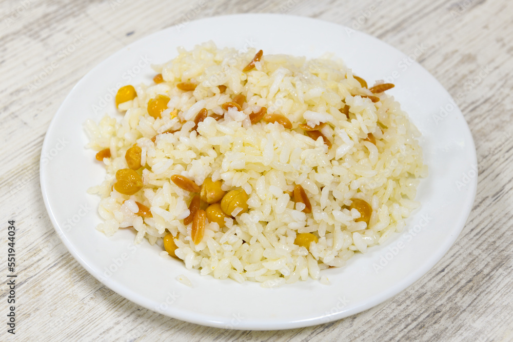 Traditional delicious Turkish food; Turkish style rice pilaf (Turkish name; Arpa sehriyeli. tavuklu, kuru fasulyeli, kavurmali pirinc pilavi) Traditional delicious Turkish food; Turkish style rice pilaf (Turkish name; Arpa sehriyeli. tavuklu, kuru fasulyeli, kavurmali pirinc pilavi)