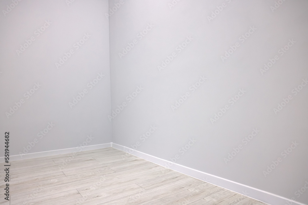 Empty renovated room with clean light walls Empty renovated room with clean light walls