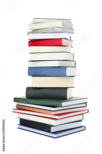 Many different books stacked on white background