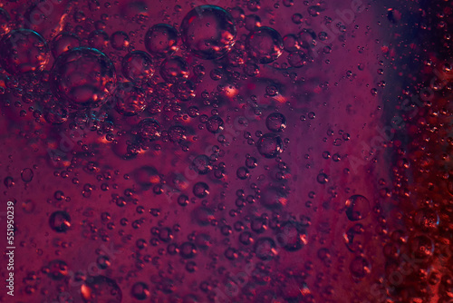 red pink rising bubbles in different sizes