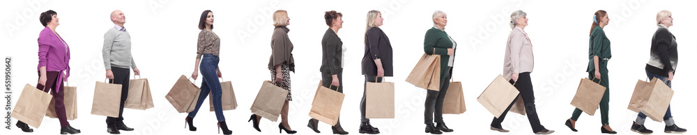 a group of people are running paper shopping bags a group of people are running paper shopping bags