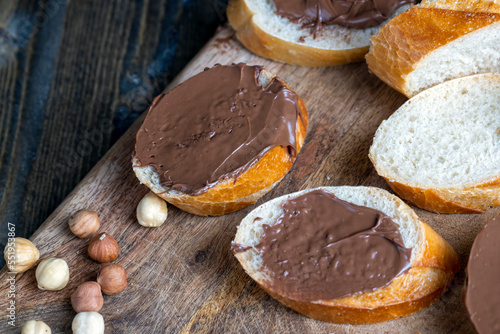 chocolate butter spread on a baguette, close up