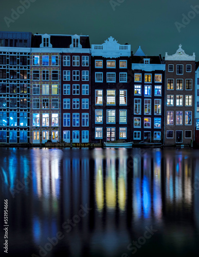 Photography Amsterdam Netherlands canals with lights during the evening in December during wintertime in the Netherlands Amsterdam city